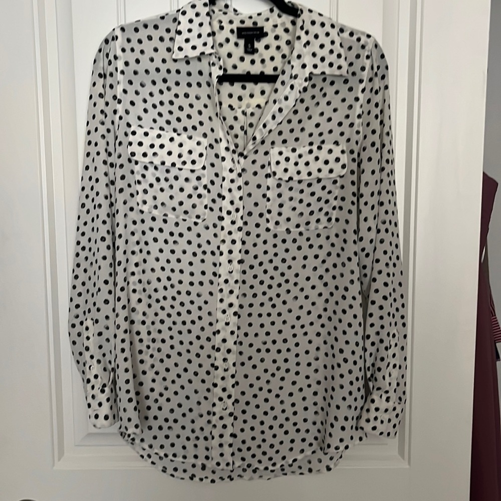White and black polka dot blouse